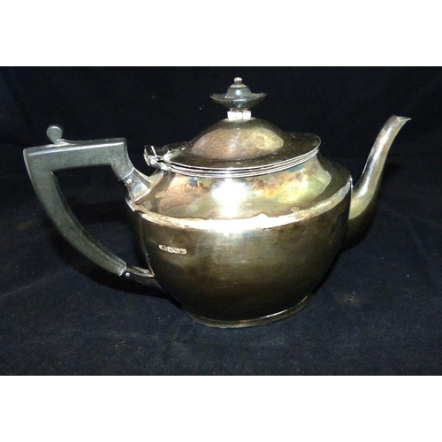 316 - A Sheffield Silver Oval Teapot having ebony handle and finial, makers mark HA, 17.7gms gross  