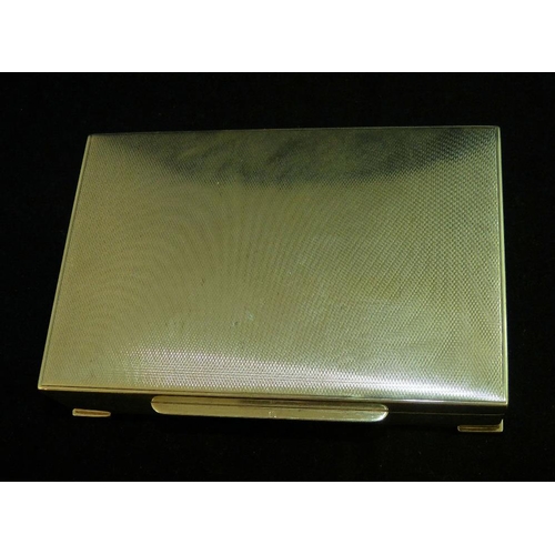 318 - An 835 Silver Coloured Metal Rectangular Shape Cigarette Box having engine turned decoration, 13cm w... 