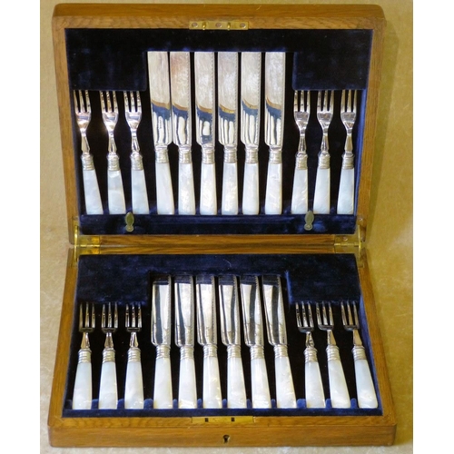 323 - A Set of 12 Silver Plated Fruit Knives and Forks having mother of Pearl handles, comprising 12 knive... 