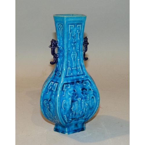 34 - An Oriental Bulbous Thin Neck 2-Handled Trumpet Shape Vase having all over chamfer decoration, on tu... 