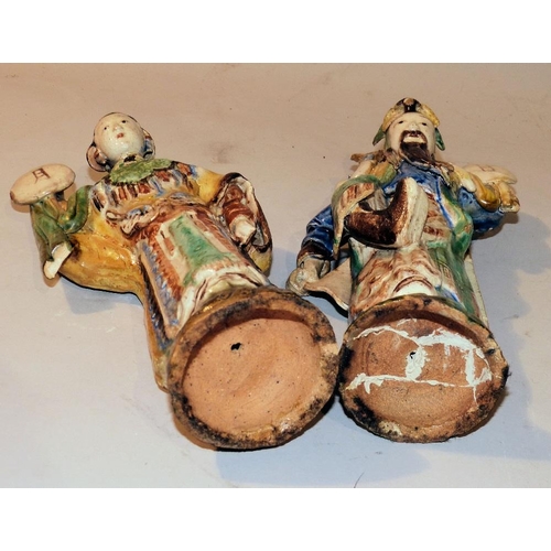 37 - A Pair Chinese Glazed Earthenware Figures of gentleman and lady in colourful clothes, 25.5cm high (g... 