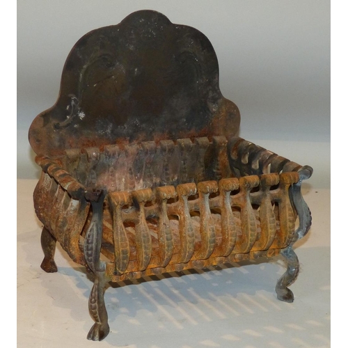 606 - A Cast Iron Fire Grate with scalloped back on splayed legs, 40cm wide, also another fire grate with ... 