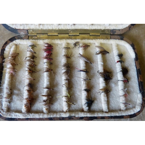 616 - A Neroda Bakelite Fishing Fly Box by Hardy Brothers, enclosing various flies  