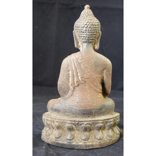 625 - A Metal Figure of a Seated Buddha, 12cm high  