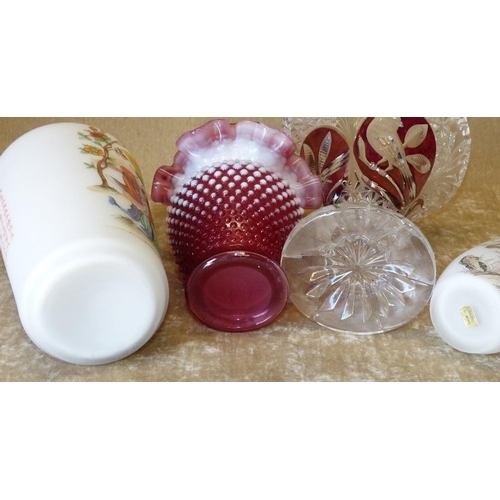 63 - A Clear and Ruby Cut Glass Round Trumpet Shape Vase having bird decoration on round sweeping base, 2... 