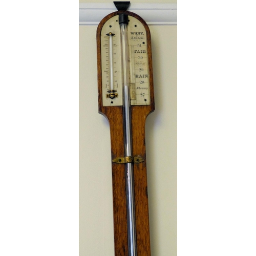 630 - A 19th Century Oak Stick Barometer with thermometer, 94cm high  