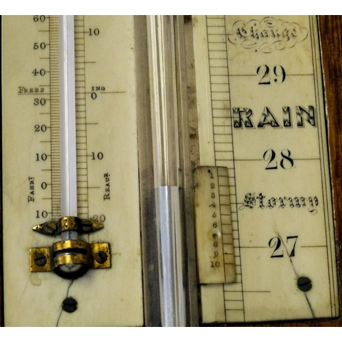 630 - A 19th Century Oak Stick Barometer with thermometer, 94cm high  