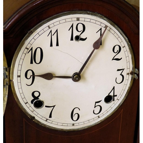 634 - An Edwardian Mahogany 8 Day Striking Mantle Clock having arched top, Corinthian column supports, inl... 