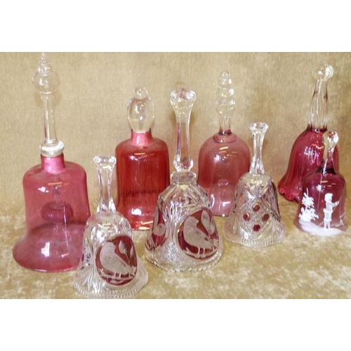 65 - A Mary Gregory Cranberry Glass Hand Bell, 4 other Cranberry glass hand bells and 3 clear and ruby gl... 