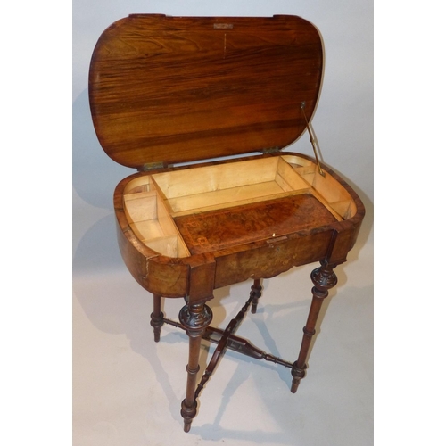 650 - A Victorian Burr Walnut Worktable having inlaid marquetry floral, stringing and banding, hinged lid ... 