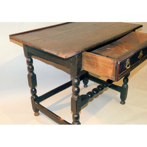 651 - An 18th Century Oak Side Table having plank top, 1 x long drawer having drop brass handles, on bobbi... 