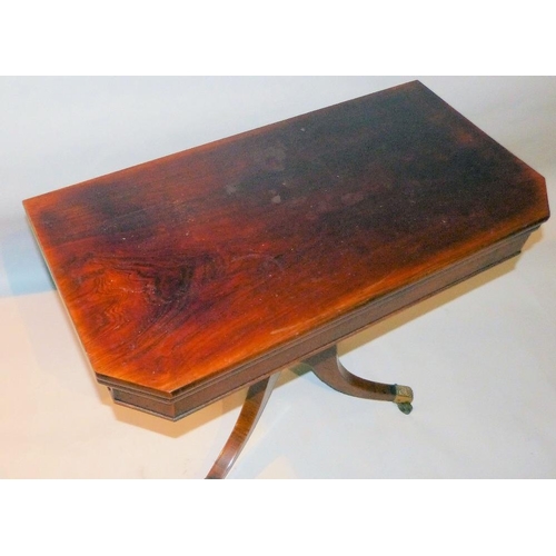 655 - A 19th Century Mahogany Card Table having chamfer corners on round gun barrel stem with 4 splayed le... 