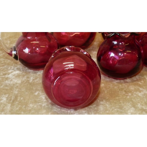 66 - A Pair of Cranberry Glass Round Bulbous Trumpet Shaped Vases having crinkle rims, 11.5cm high, a pai... 