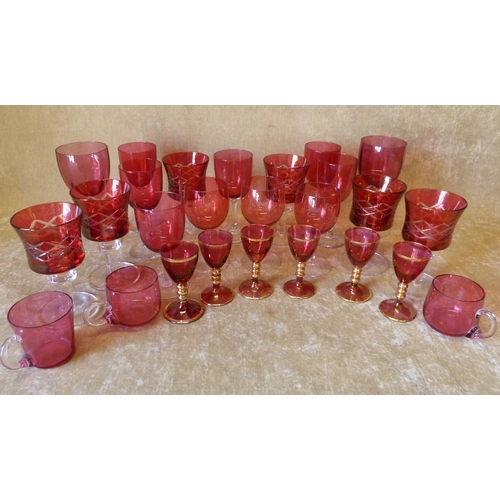 68 - A Set of 6 Ruby Wine Glasses having clear stems and round bases, also 20 various other Cranberry dri... 