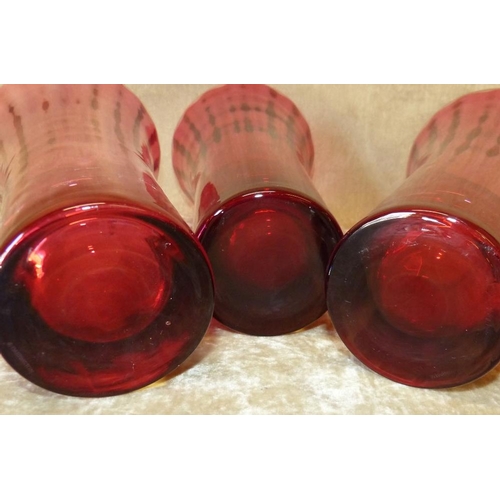 78 - A Set of 3 Cranberry Glass Round Trumpet Shape Vases, 28cm high  