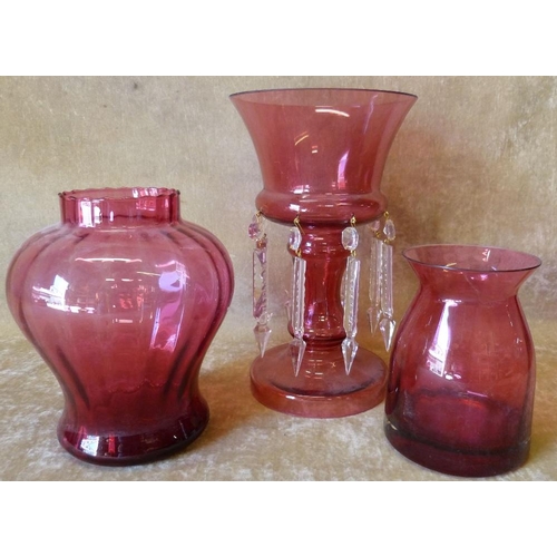 81 - A Cranberry Round Trumpet Shape Vase having lustres drops on round sweeping base, 26cm high, also 2 ... 