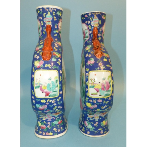 28 - 2 x Similar 20th Century Large Moon-Flask Vases on white and blue ground having multicoloured figure... 