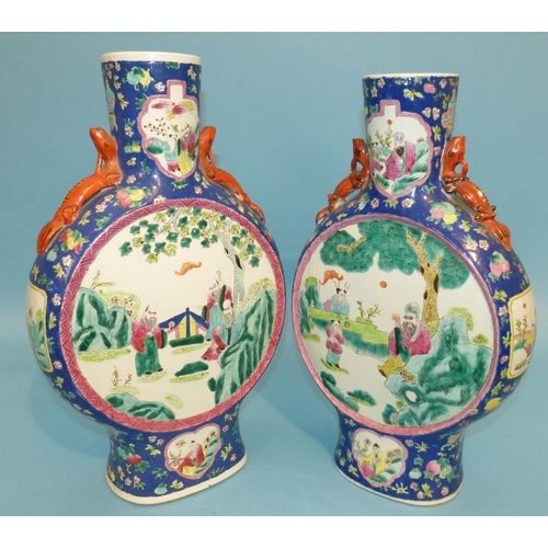 28 - 2 x Similar 20th Century Large Moon-Flask Vases on white and blue ground having multicoloured figure... 