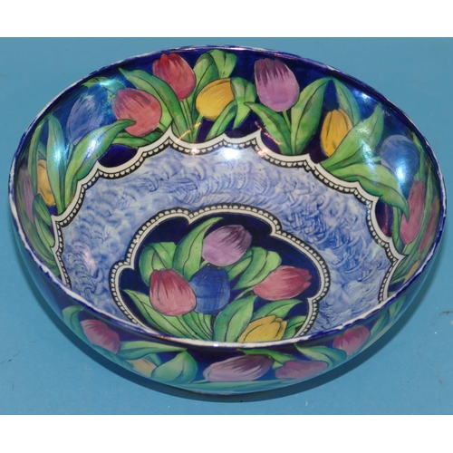 45 - A Maling Round Bowl on blue ground with multicoloured tulip and leaf decoration, 21.5cm diameter