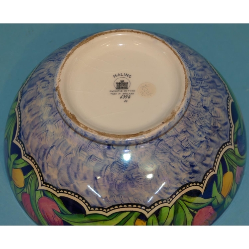 45 - A Maling Round Bowl on blue ground with multicoloured tulip and leaf decoration, 21.5cm diameter