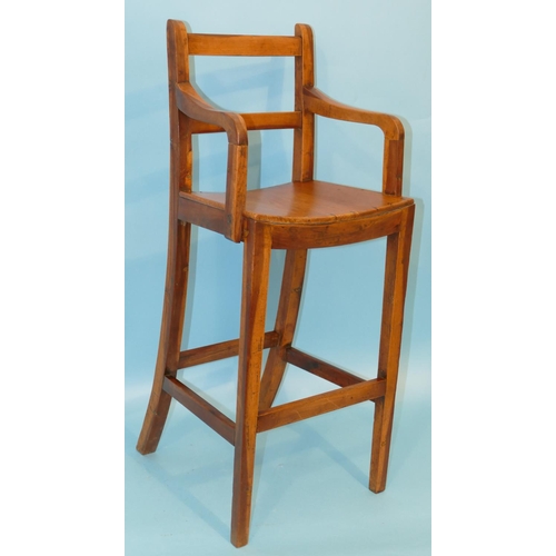 629 - A 19th Century Elm Child's Highchair having solid seat on square tapering legs, 85cm high