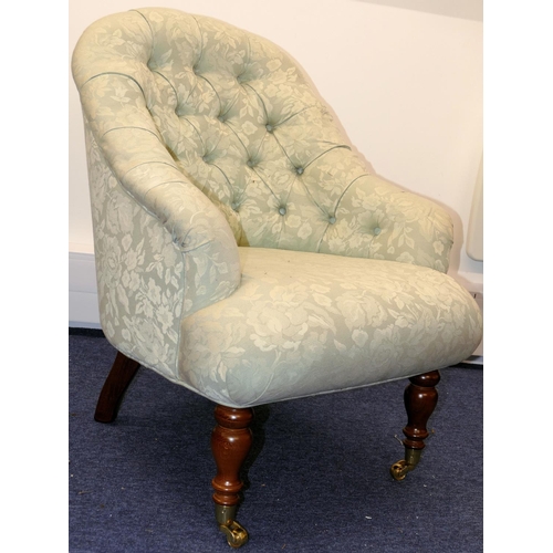 631 - A Reproduction Mahogany framed Tub Chair having pale green, floral and leaf upholstery with button b... 