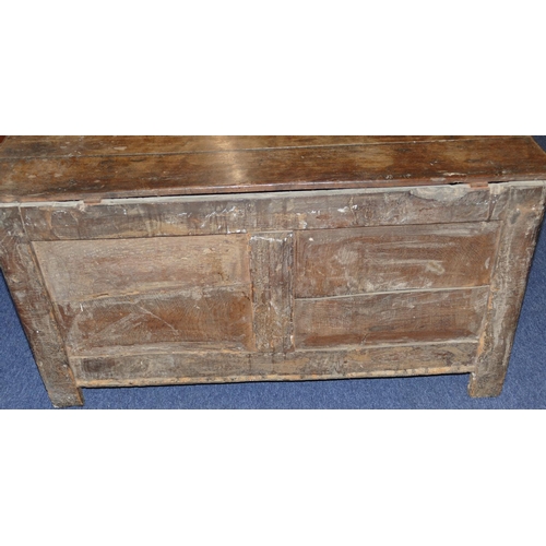 635 - An 18th Century Oak Dower Chest having triple panelled front, hinged lid, enclosing candle box, on s... 