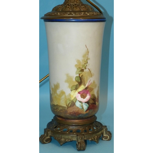 8 - A China and Brass Paraffin Lamp (converted to electricity) having china body with hand painted bird ... 