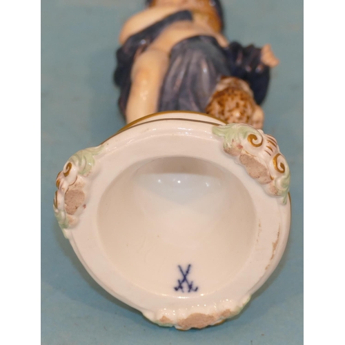 118 - A Meissen Figure of a young cupid draped in a blue cloth with crown standing next to an owl, on glob... 