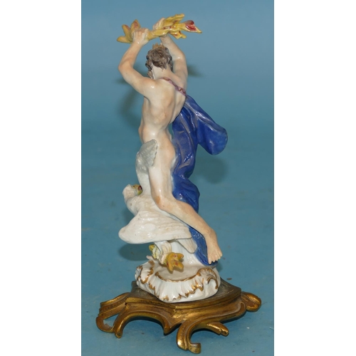 119 - An 18th Century Meissen Figure of a God, wearing a crown standing upon a white bird, draped in a blu... 