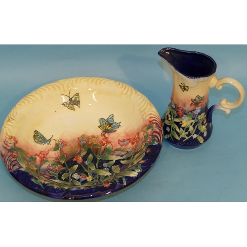 13 - A Modern China Small Jug and Basin on yellow and blue ground with multicoloured butterfly, floral an... 