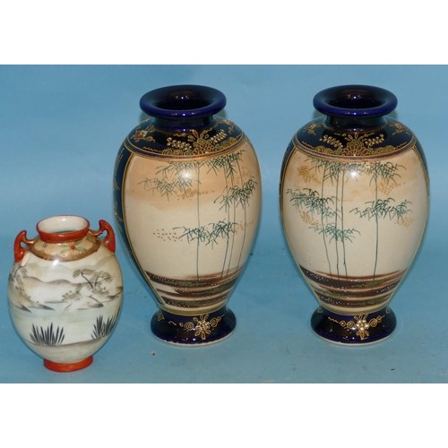 139 - A Pair of Oriental Round Bulbous Thin Necked Vases on blue and cream ground with multicoloured warri... 