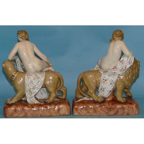 18 - A Pair of Continental Figures of Female Nudes Seated Upon Animals on rectangular shaped bases, 29cm ... 