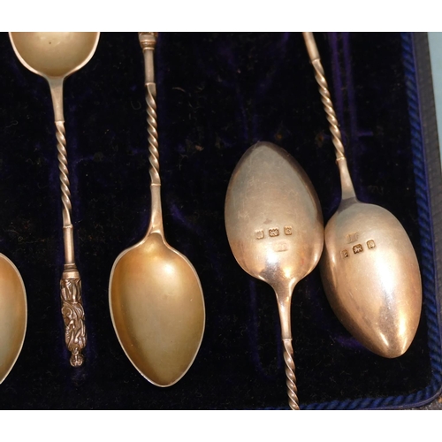 220 - A Set of 6 Birmingham Silver Apostle Tea Spoons having twist stems in fitted black leather case.