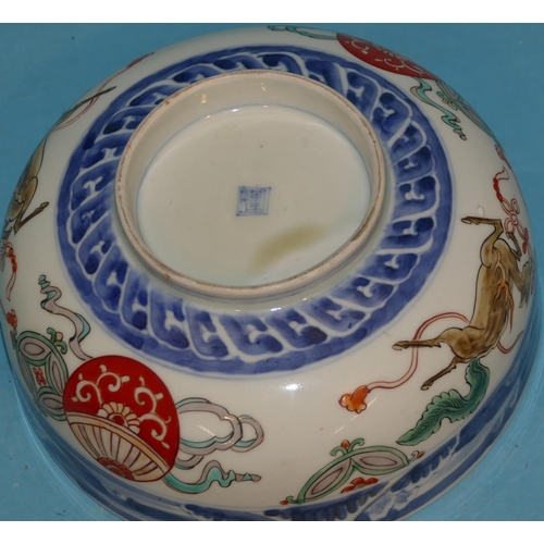 3 - An Imari Small Round Bowl on white and blue ground with multicoloured bird branch, floral and scroll... 