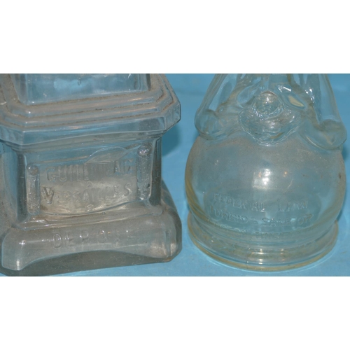 35 - A Square Glass Obelisk Star Decanter with stopper, also another clear glass decanter depicting lady ... 