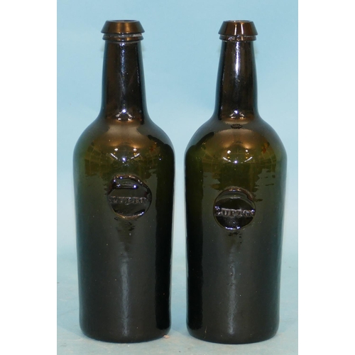 38 - 2 Lupton Green Glass Bottles, 28cm high.