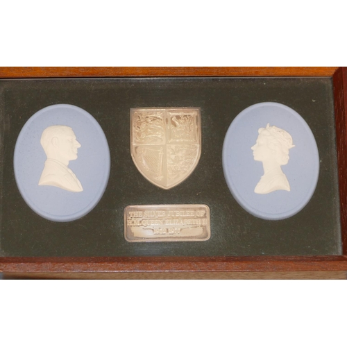 53 - A Pair of Limited Edition Wedgewood Jasperware Oval Commemorative Plaques, Queen Elizabeth II in mah... 