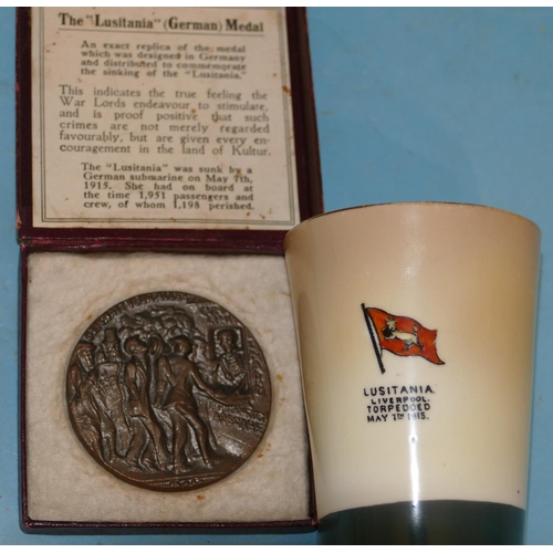 54 - A Blairs China Trumpet Shape Beaker (Lusitania), also a similar medal boxed (2)