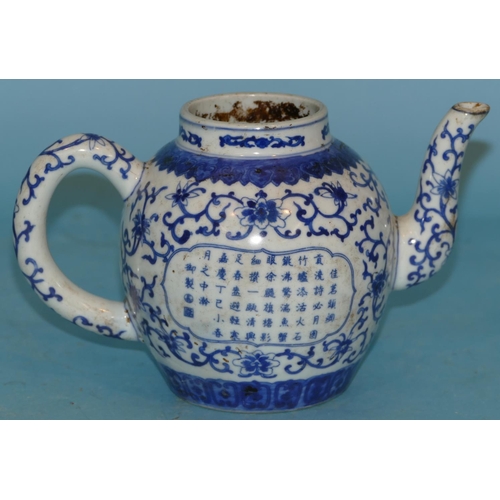 70 - An Oriental Blue and White Round Bulbous Shaped Teapot with all over floral, leaf and inscription de... 