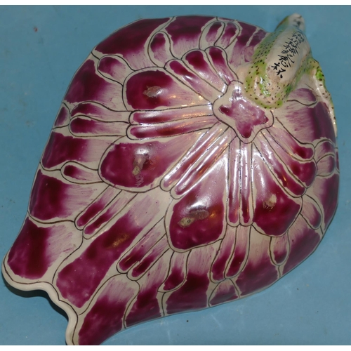 71 - An Oriental Leaf Shaped Bowl with spout on white, red and green ground, 17cm wide.