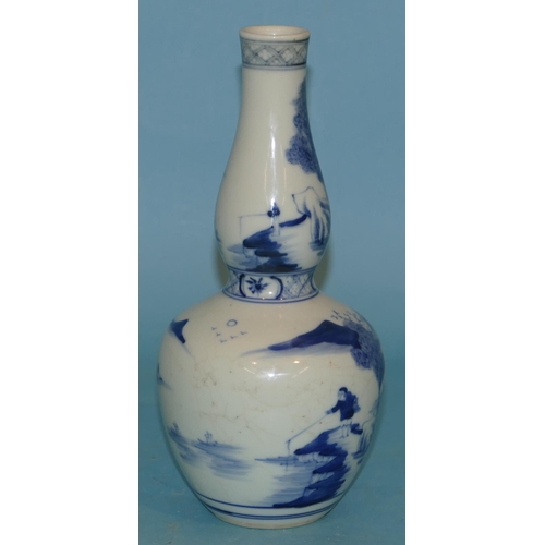 73 - An Oriental Blue and White Round Bulbous Gould Vase having fisherman, river landscape and building d... 