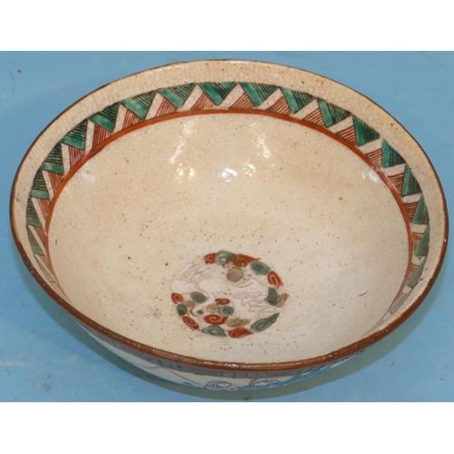 81 - An Oriental Round Trumpet Shaped Fruit Bowl on cream and brown ground with multicoloured figure and ... 