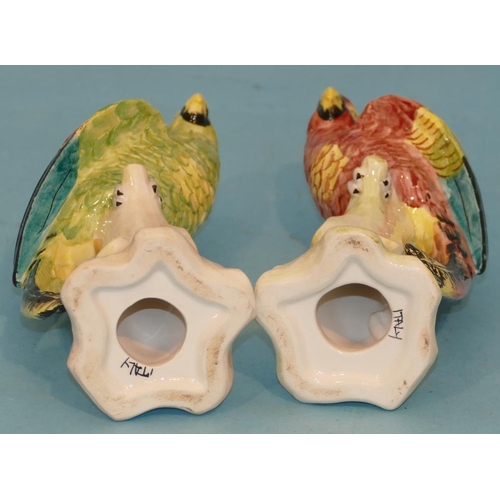 138 - A Pair of Continental China Figures of perched parakeets, 20.5cm high.