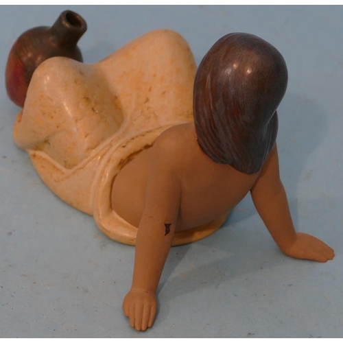 27 - A Lladro Glazed Earthenware Figure of a reclining half naked lady (1 arm restored) 24cm long.