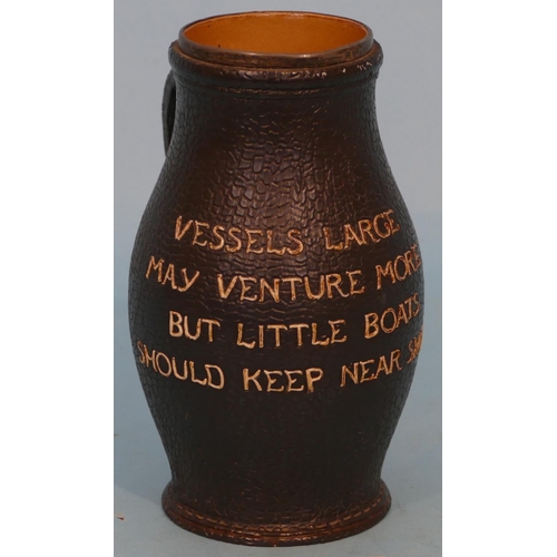 29 - A Doulton and Lambeth Glazed Stoneware Tankard in form of leather with verse having silver rim (chip... 