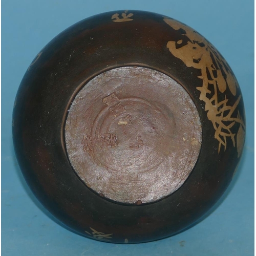 42 - An Oriental Round Bulbous Thin Necked Vase on brown ground having floral and inscription decoration ... 