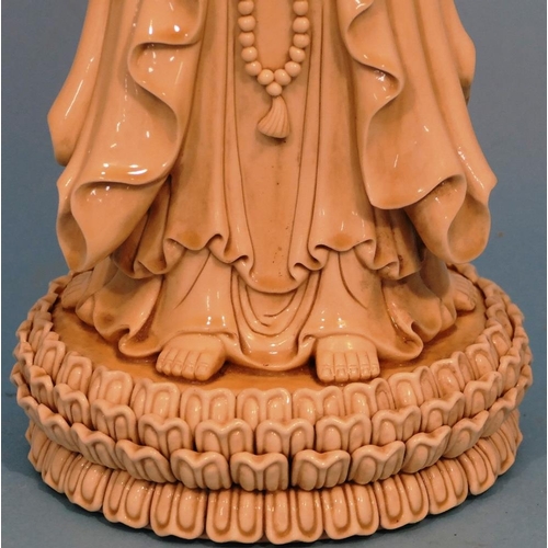 49 - An Oriental Blanc de Chine Group of 3 standing goddesses on circular base, 47cm high.