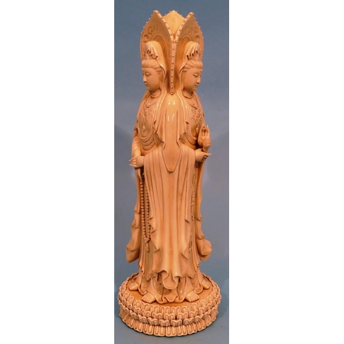 49 - An Oriental Blanc de Chine Group of 3 standing goddesses on circular base, 47cm high.