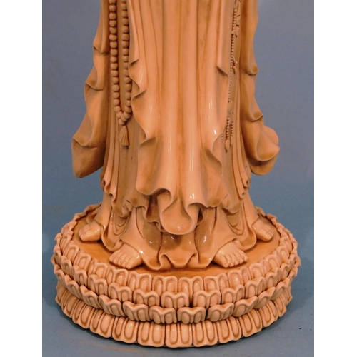 49 - An Oriental Blanc de Chine Group of 3 standing goddesses on circular base, 47cm high.